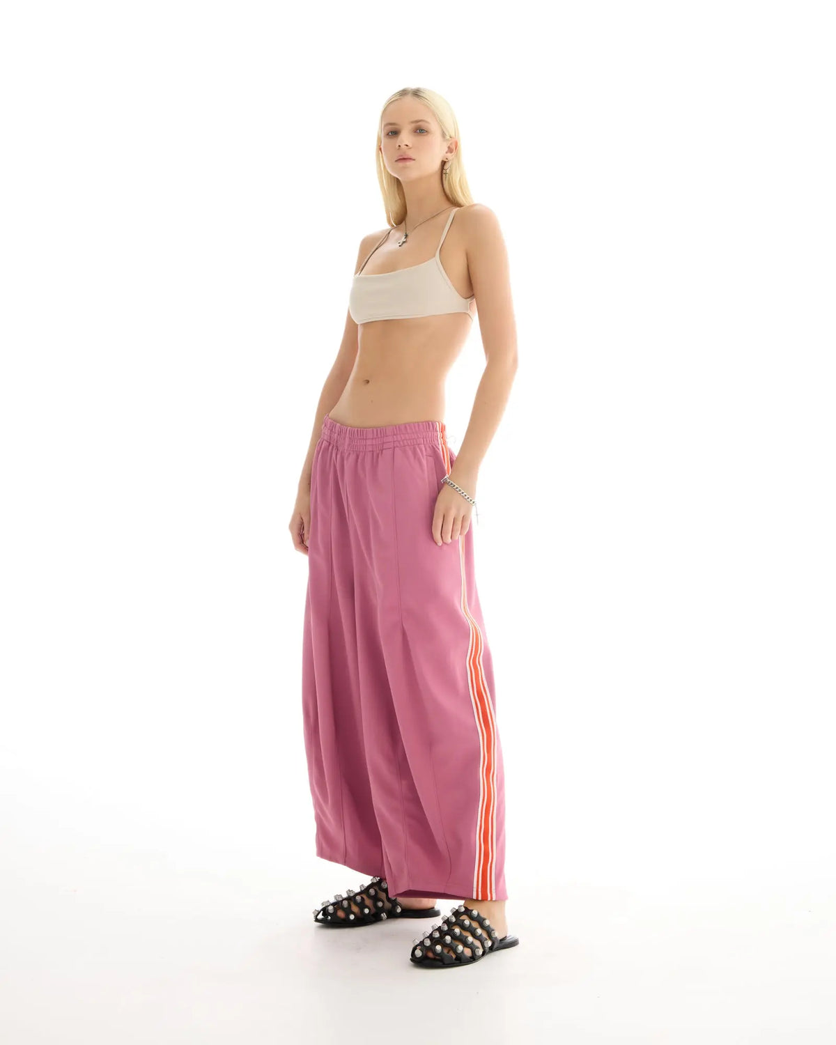 The Tales Harajuku Muted Pink Track Pant by THE TALES - pink colorway, front view