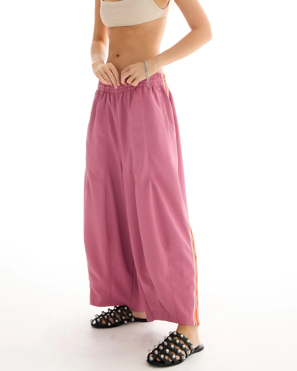 The Tales Harajuku Muted Pink Track Pant by THE TALES - pink colorway, side view
