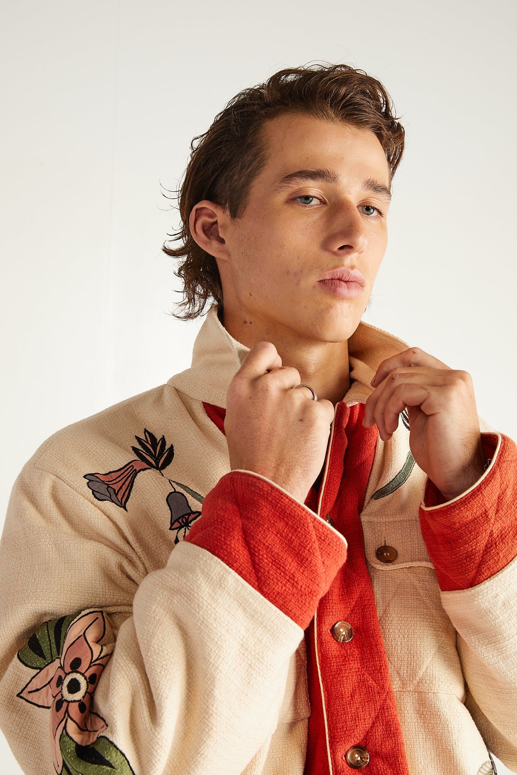 Gesteppte Jacke mit Blumenapplikation